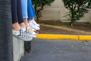 A close up of teen girls legs dangling. If you suspect your teen is participating in at-risk behaviors, our teen counseling in Katy, TX can help! Reach out to us today.